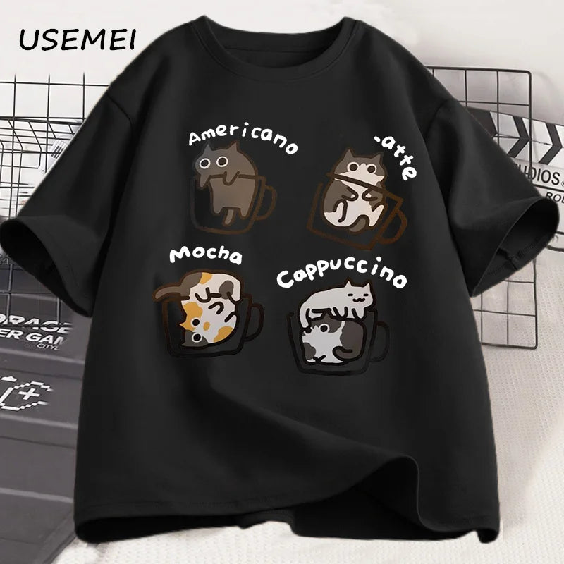Black t-shirt with cat-themed coffee cup designs and text on a white background